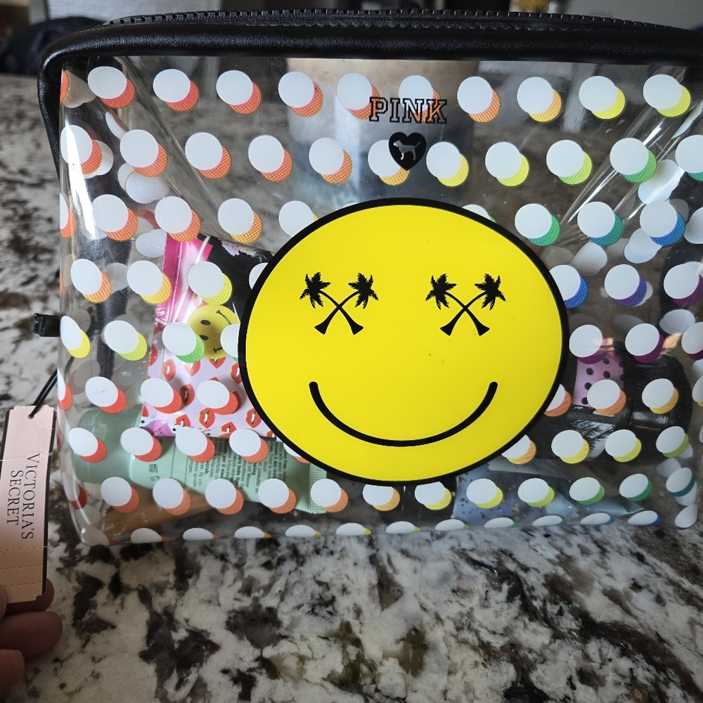 LNWT VS PINK Cosmetic bag. Clear with dots and smiley face.